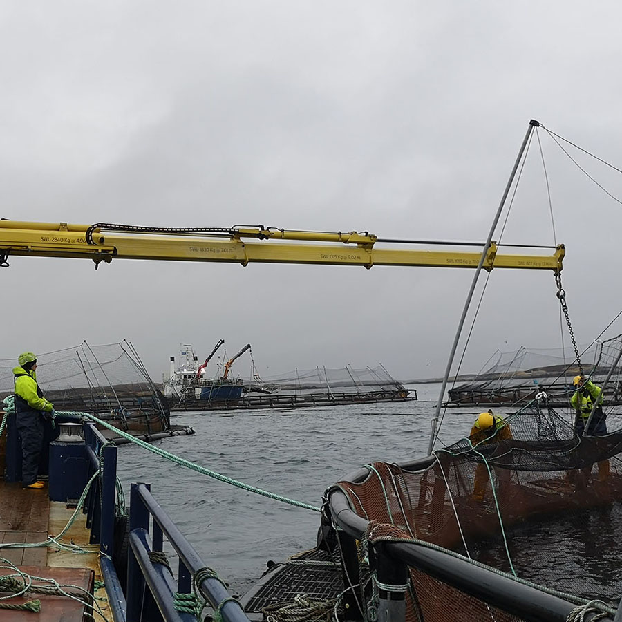 Voe Marine Vessel with crane at a sea farm